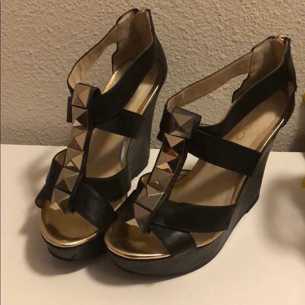 ALDO platforms with large gold stud details